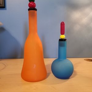 Decorative vintage glass art bottles set in basic colors